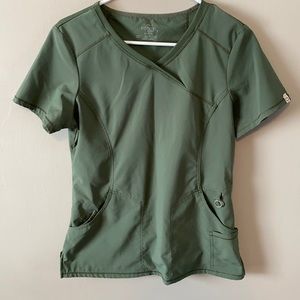 Cherokee Infinity stretchy scrip top size small in women’s